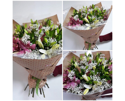 Delicate bouquet of lilies and gypsophila in a stylish package!