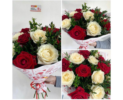 A bouquet of white and red roses with boxwood!