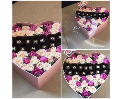 Arrangement of spray roses and chocolate letters in a hat box for your beloved mother!