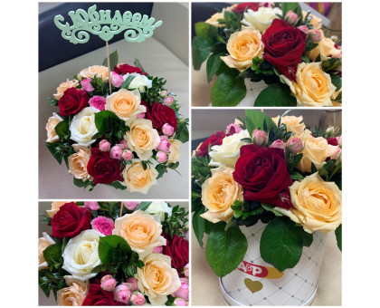 Arrangement of roses in a hat box!