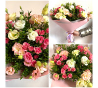 A chic bouquet of eustoma and Bush roses with the addition of boxwood!